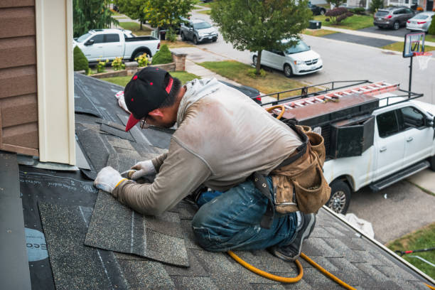 Professional Roofing technician working in South Windham, CT